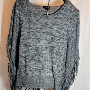 #1274 Anna poncho sweater.  Fringed bottom.